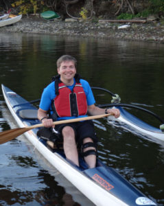 image of gentlemen performing therapeutic kayaking