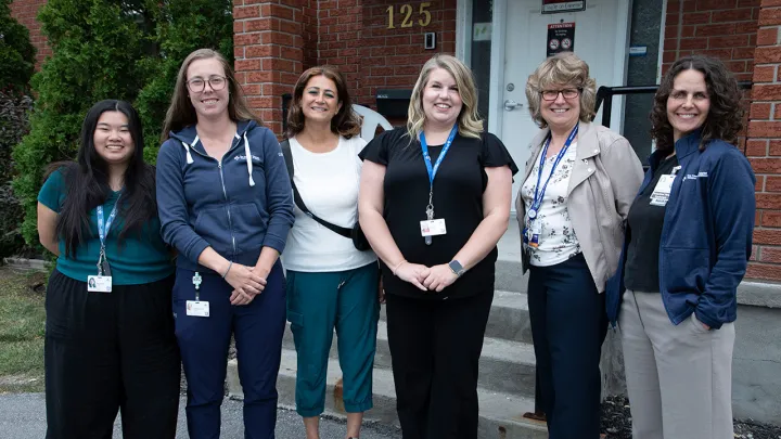 Members of the Robin Easey Centre team pose outside the Centre.