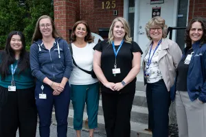 Members of the Robin Easey Centre team pose outside the Centre.