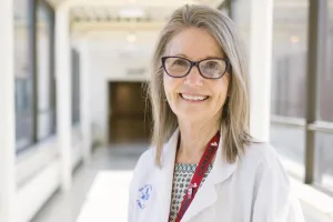 A portrait of advanced Practice Nurse Sheryl McDiarmid smiling.