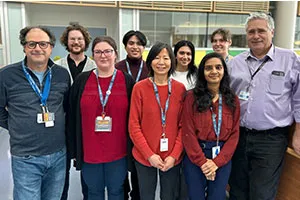 Group photo of OHRI staff members standing together indoors.