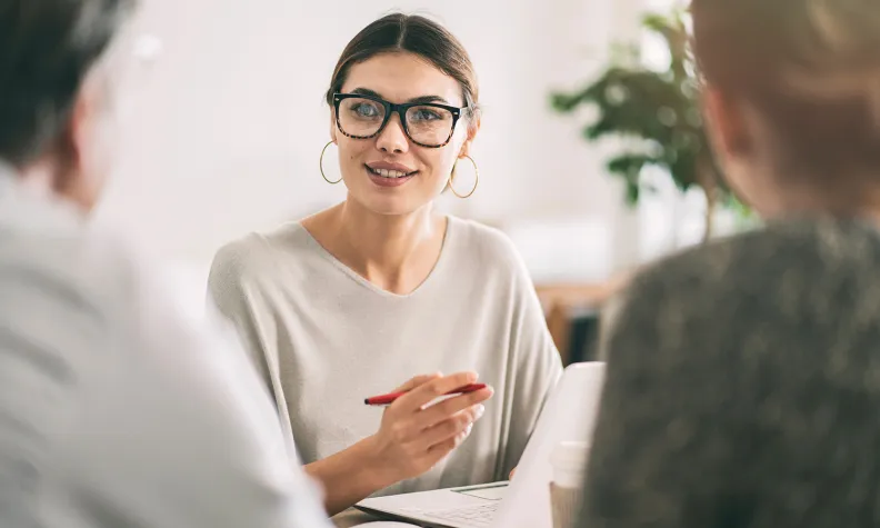 Meeting discussion with three people