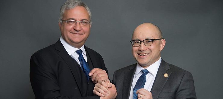 Dr. Robert Feibel (left) and Dr. Eugene Wai are sporting their hospital-blue ties