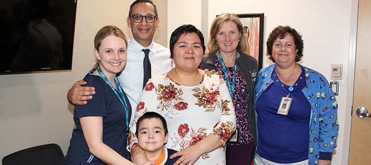 CHEO staff in the Pediatric Intensive Care Unit meeting Nina Kautuq (centre) and son Jutanie. Brooke Akeson (left), Dr. Sonny Dhanani (back), Carol Ernewein, Suzanne Guay (right) and Kim Seguin (who joined the meeting by FaceTime)
