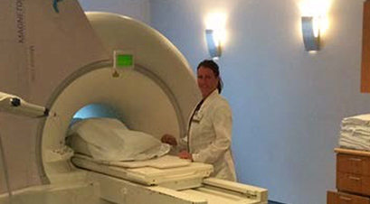 A hospital staff using an MRI machine