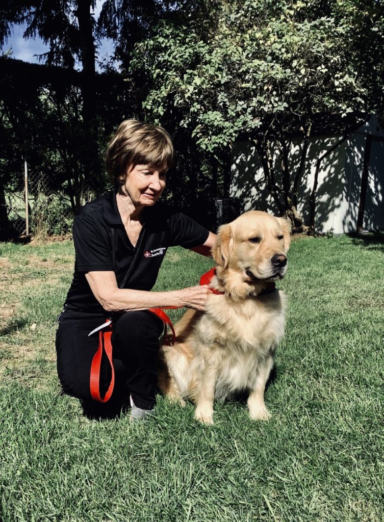 Happy, the therapy dog with her owner, Joanne Rodgers