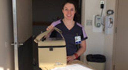 A nurse helping at Blood and marrow transplant program