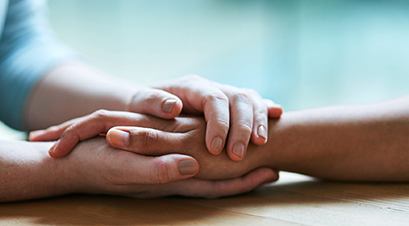 Holding hands and showing that we care