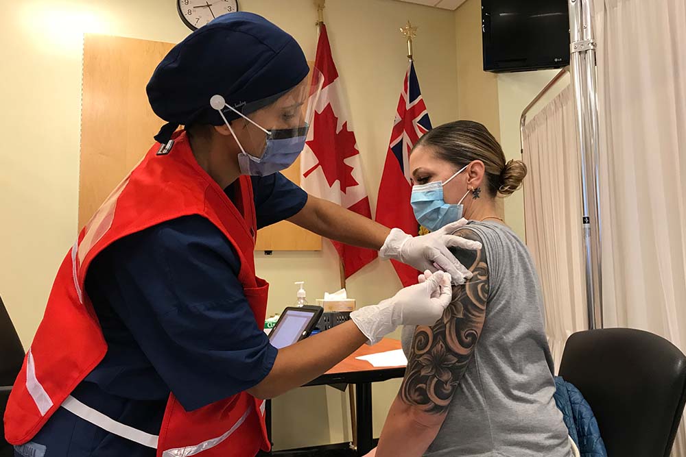 Jo-Anne receiving second dose of vaccine