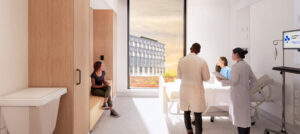 An artist rendering of a patient room at the new hospital. A patient is sitting up in bed talking to a visitor, while two physicians are at the patient’s bedside. A large floor to ceiling window in the room provides a clear view outdoors.
