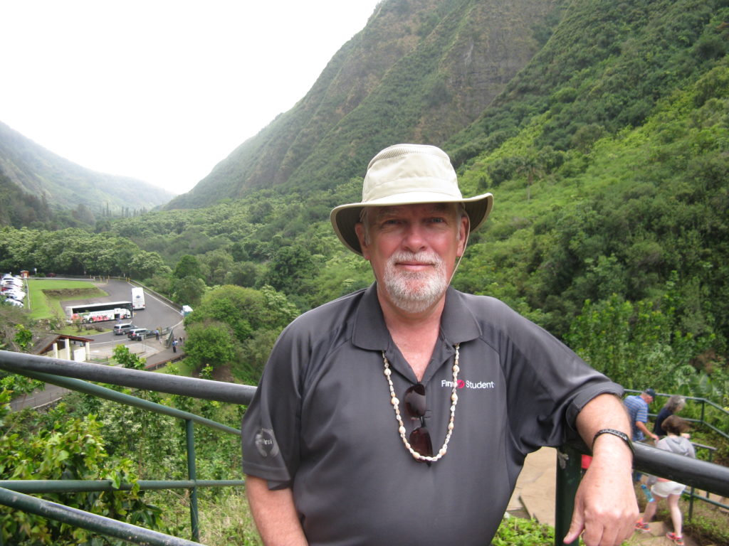 Wayne Herrick in Mexico with trees in the background.