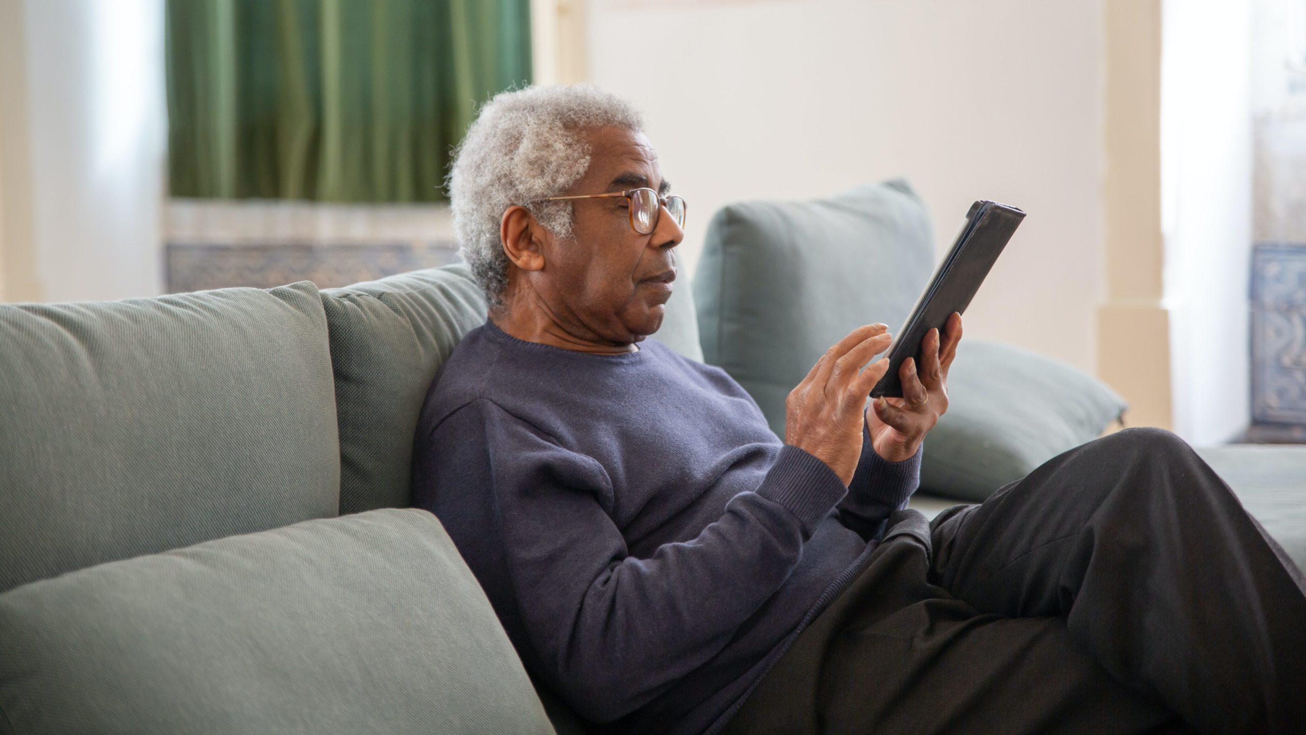 Man talking to his doctor via video