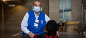 Volunteer Michael Bourassa and his dog, Copain