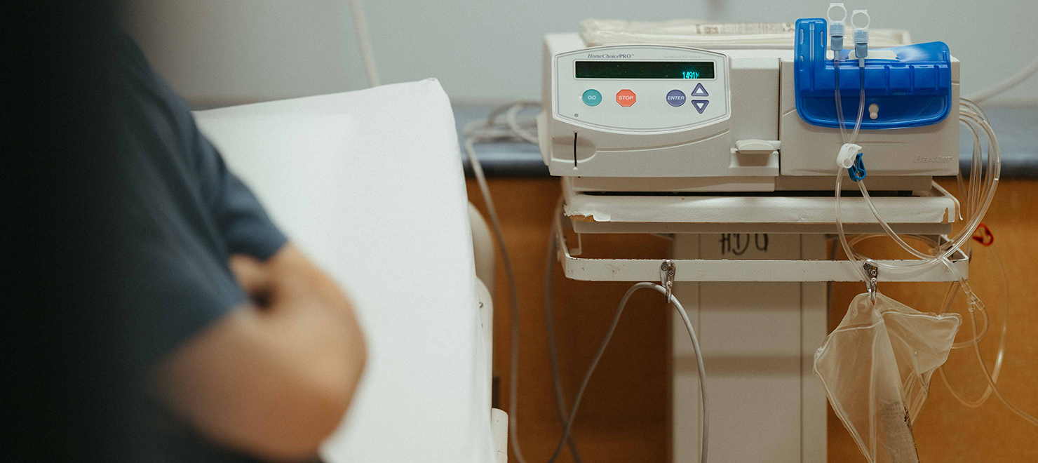 A patient using peritoneal dialysis equipment