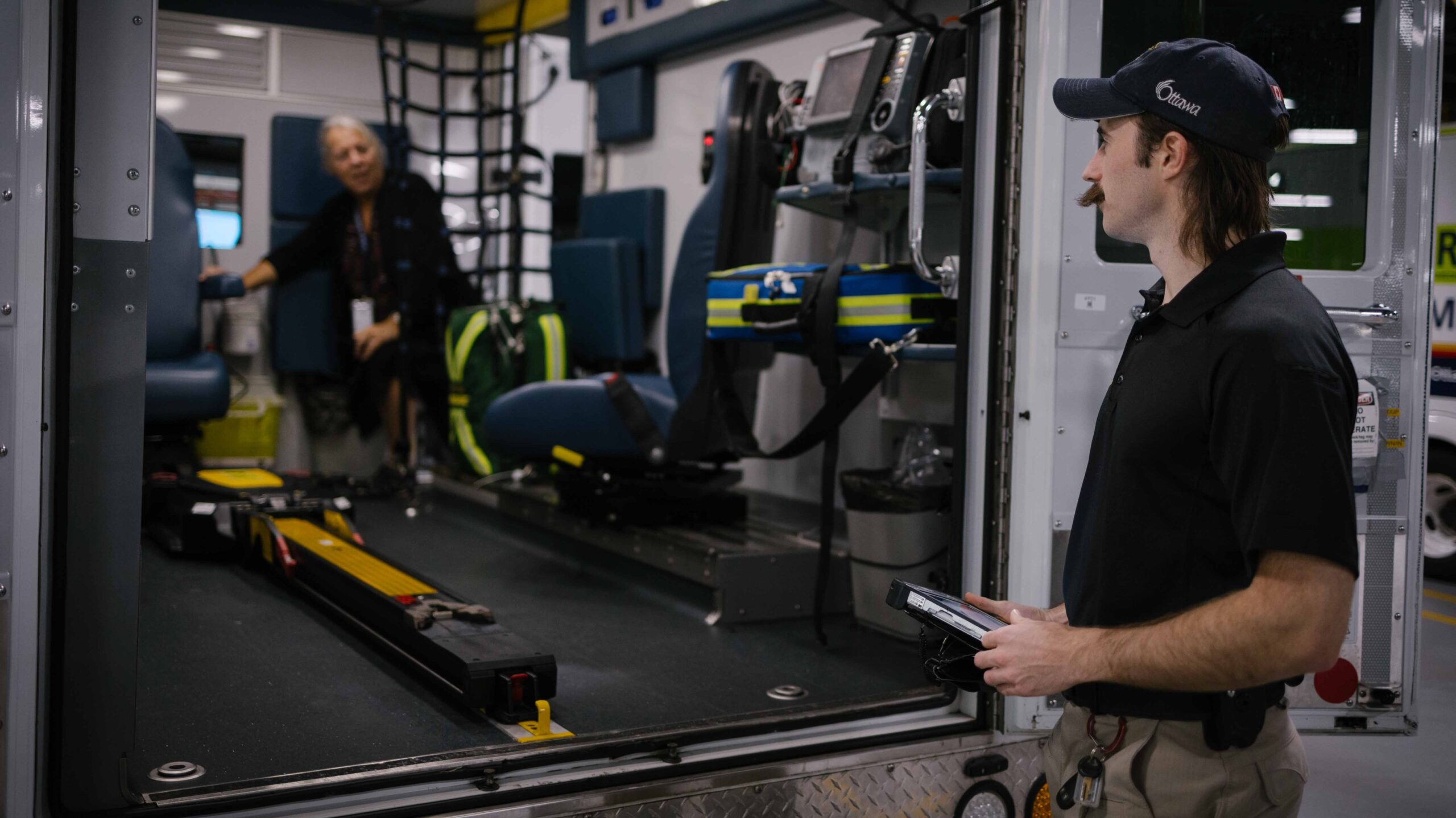 Cindy and Scott perform a check of the vehicle. 