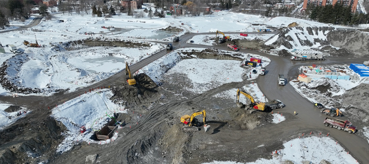 An aerial view of the site of The Ottawa Hospital's new campus. Excavators are clearing material in the area where the hospital will be located.